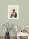 Hulm surreal portrait art print displayed in Scandinavian style reading corner with eucalyptus and Windsor chair, dreamlike contemporary wall art for modern farmhouse decor and minimalist interior design
